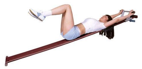 Exercise machine for treatment of osteochondrosis at home